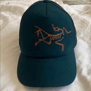 Teal trucker hat.